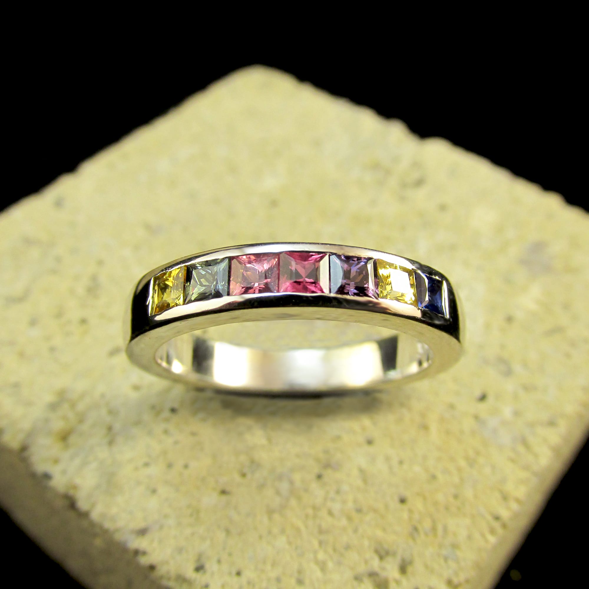 9ct White Gold Rainbow Sapphire Channel Set Ring (Ref#26065)