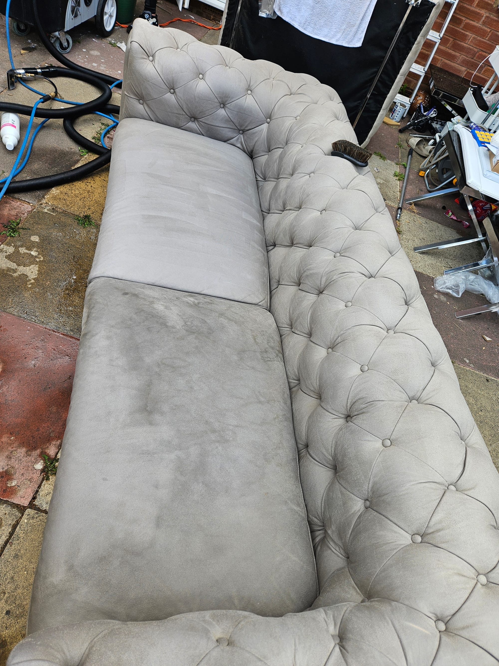 Half way through a Chesterfield suite Upholster clean