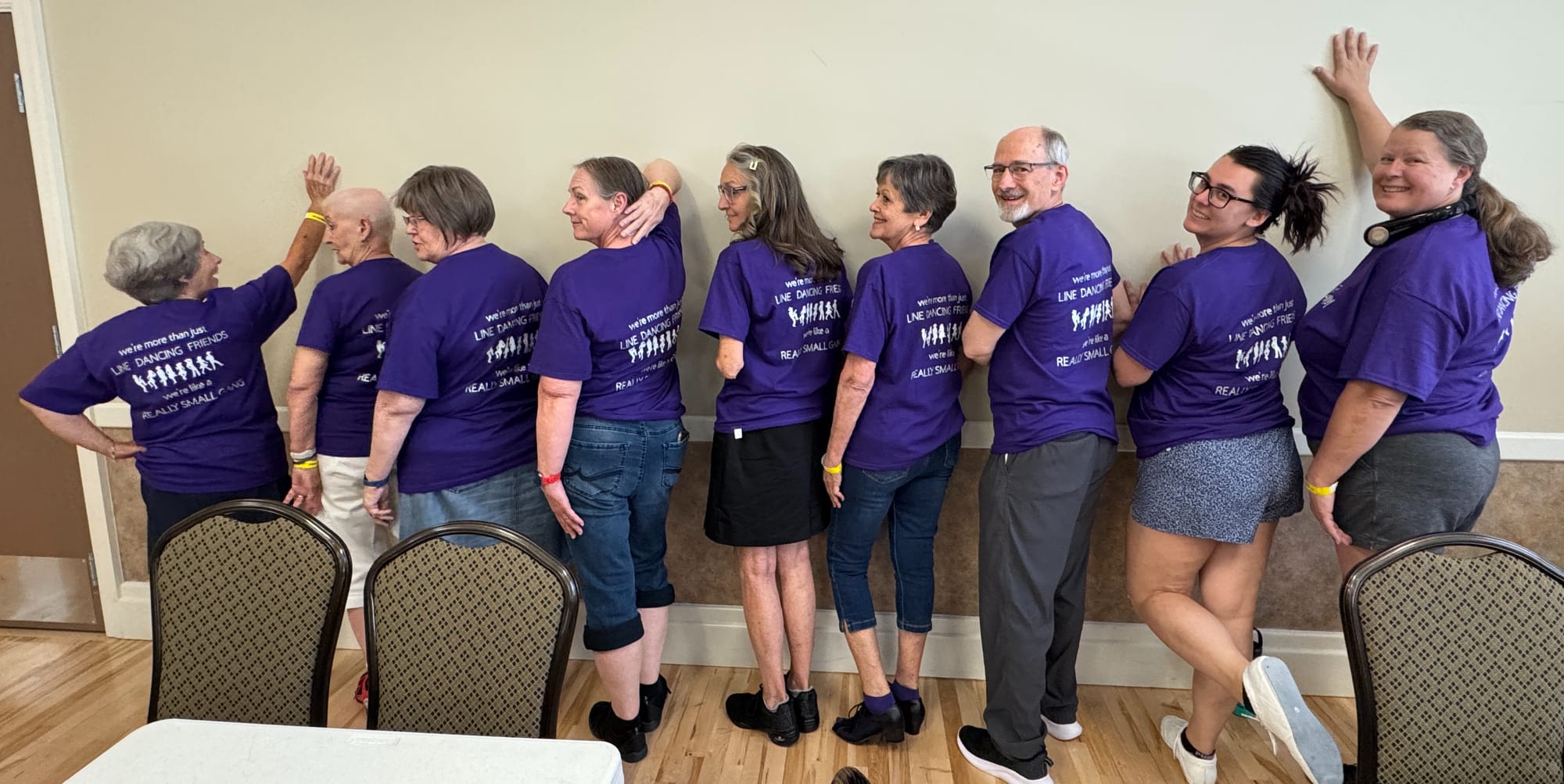 Dancers trying to show of shirt backs