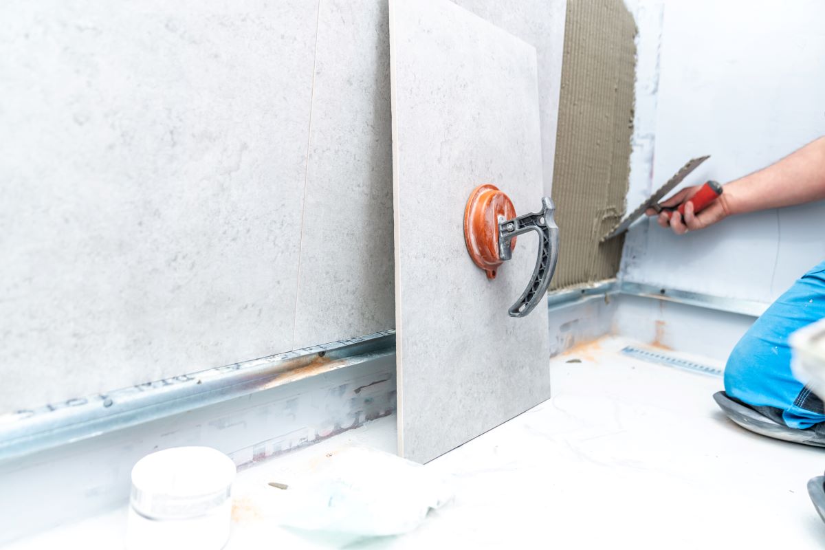 installation large format tiles on wall