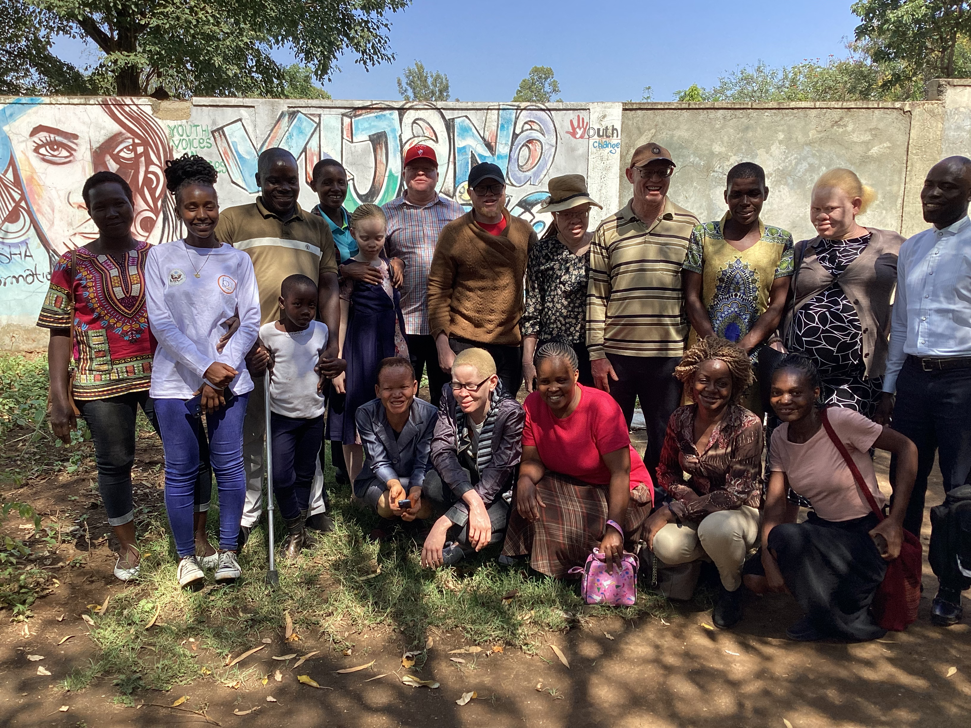 Group photo of Persons with Albinism and their caregivers in Kisumu County