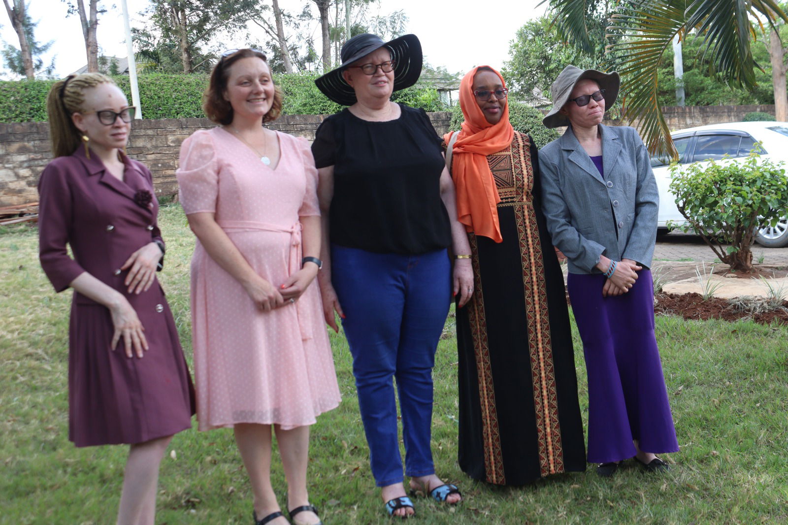 A picture of Black Albinism's climate change action champions and representatives from the US Embassy.