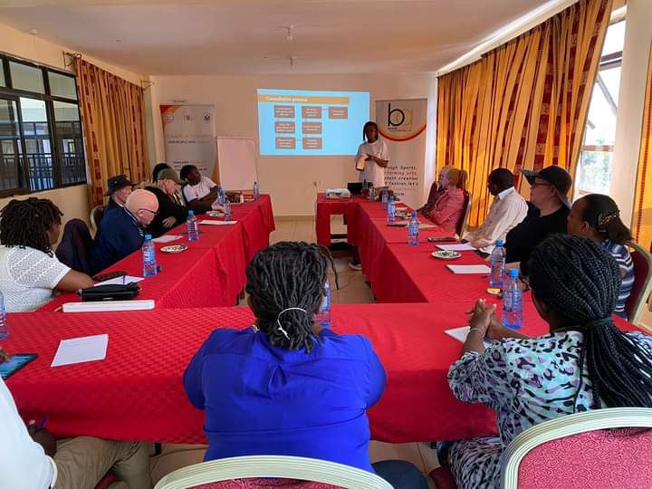 A picture of climate change action champions in Machakos county discussing matters around albinism.