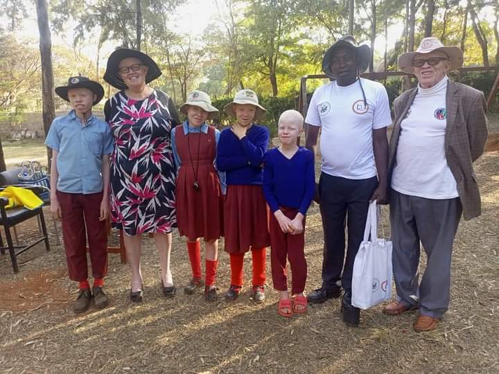 A picture of climate change action champions creating albinism awareness in the village, Machakos County.