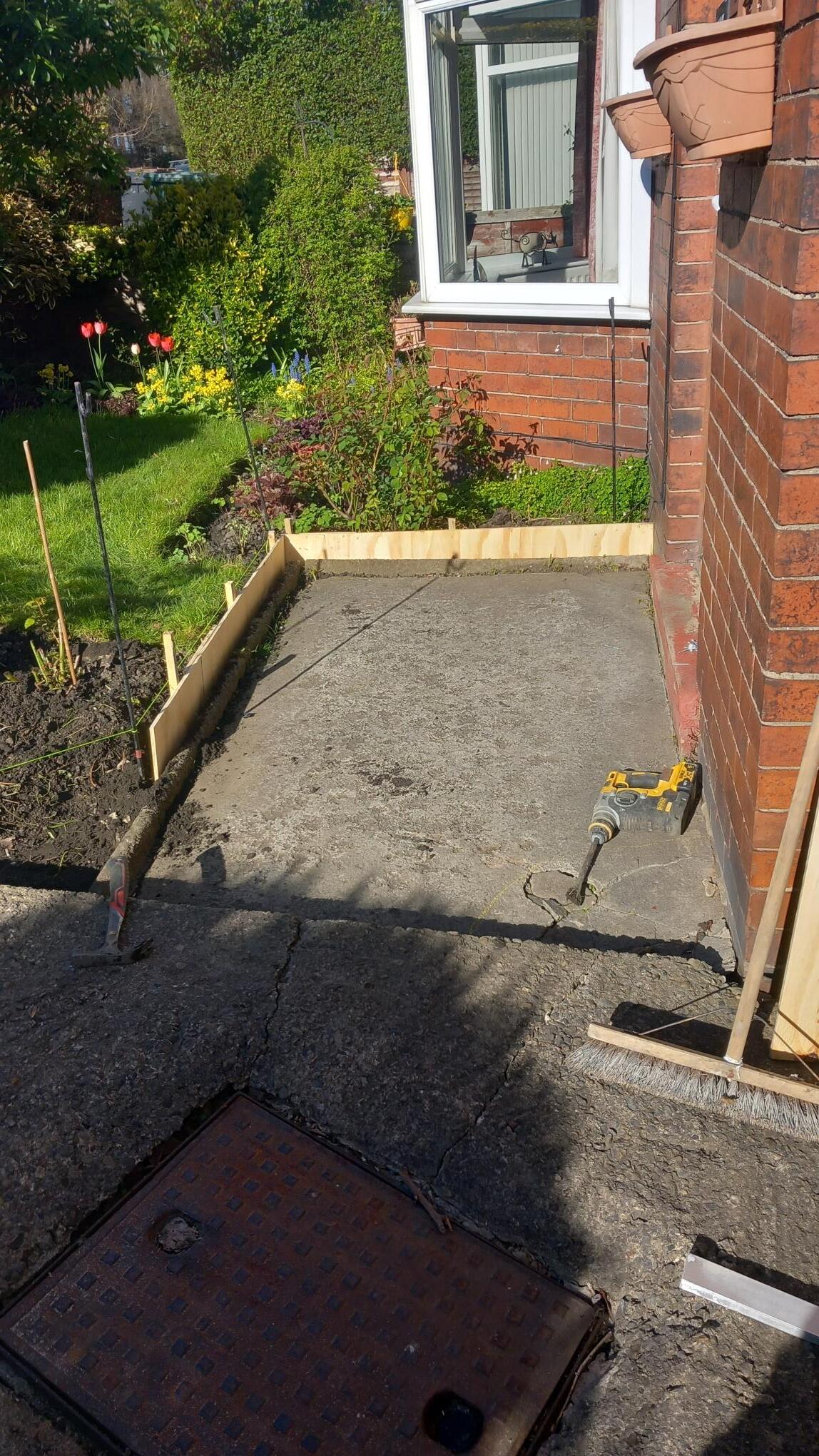 Concrete ramp for a wheelchair user