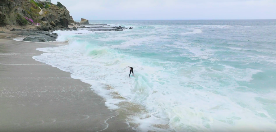 LAGUNA BEACH TOURISM - SKIMBOARDER