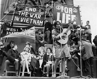 Protesters listening to live music in 1960s London