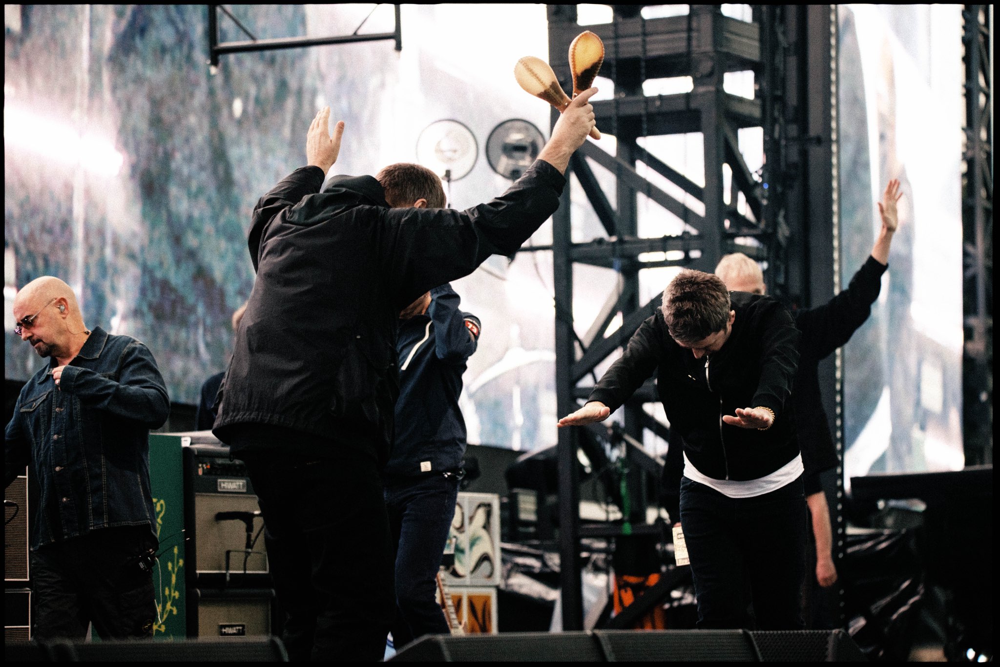 Noel and Liam Gallagher bow to each other. Oasis Live at Heaton Park 20th July 2025