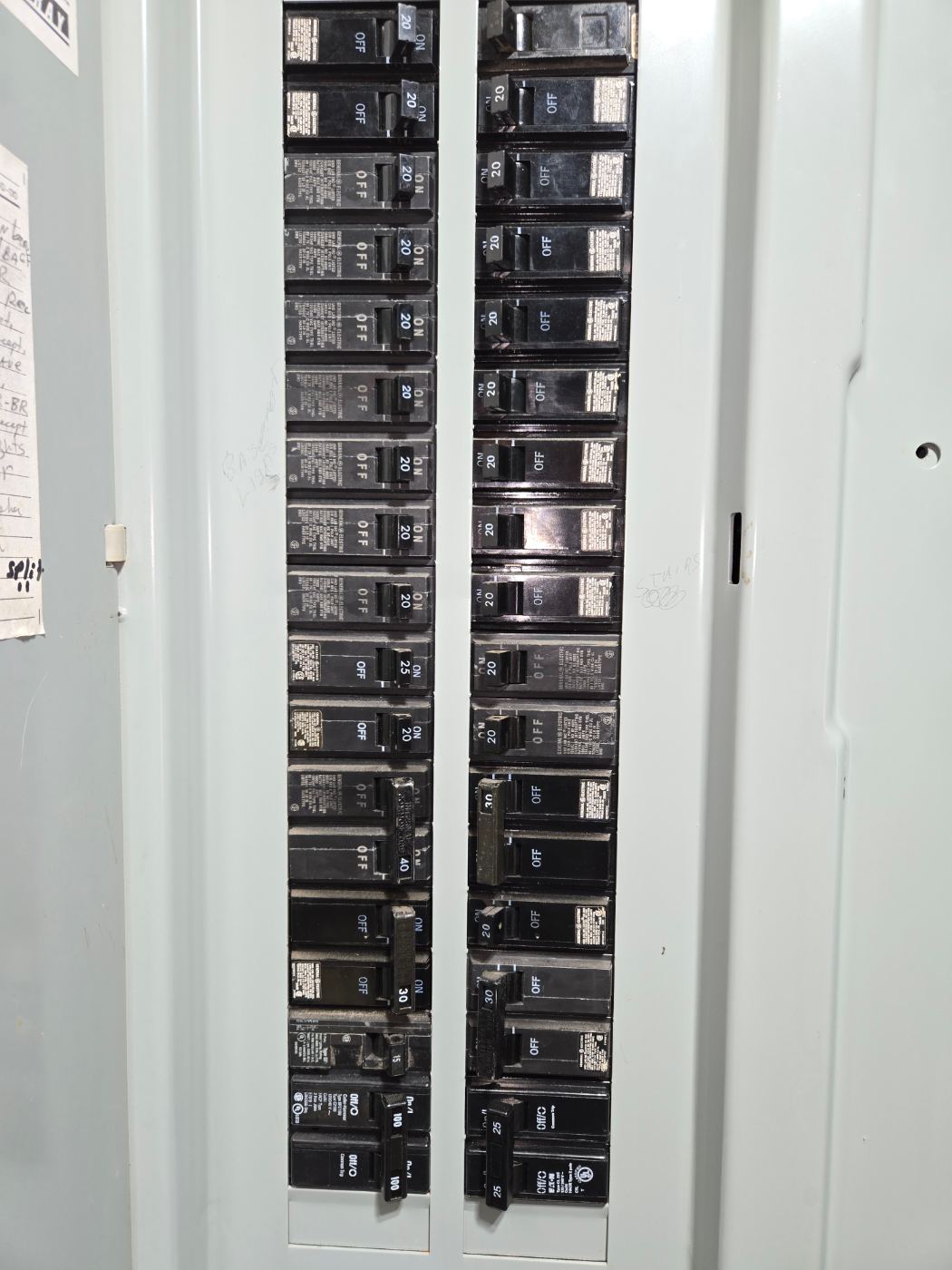 Full breaker panel with neatly installed breakers by Stickler’s Electrical Service near Hickory, NC
