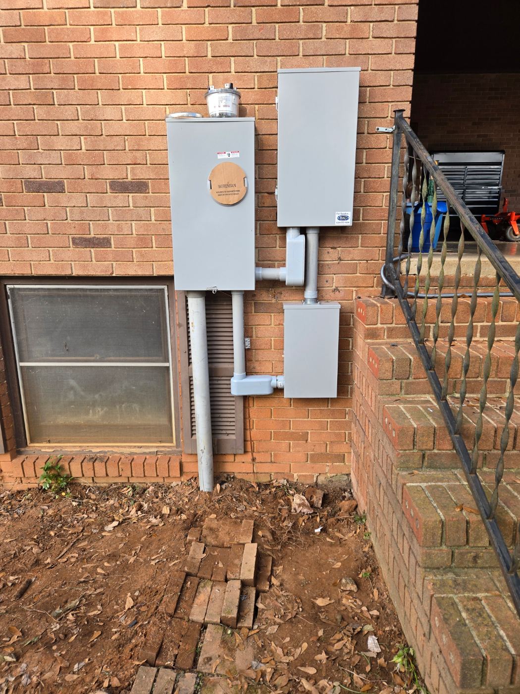 New exterior electric service meter and disconnects installed by Stickler’s Electrical Service, electrician serving Newton, NC