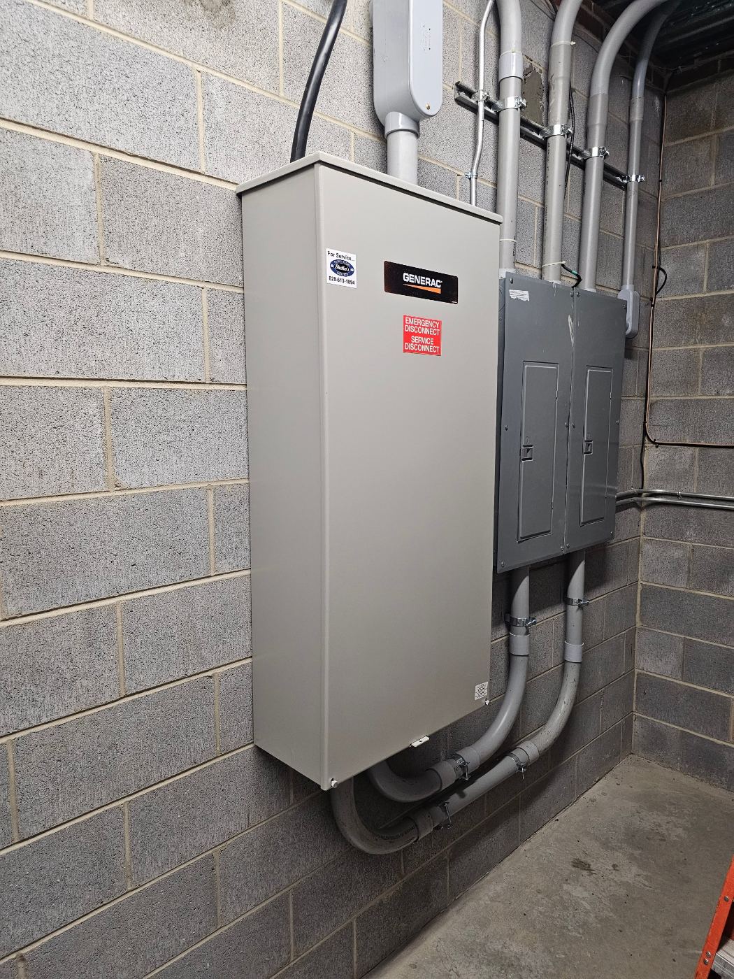 26kW Generac generator 400-amp transfer switch installed in a basement in Granite Falls, NC