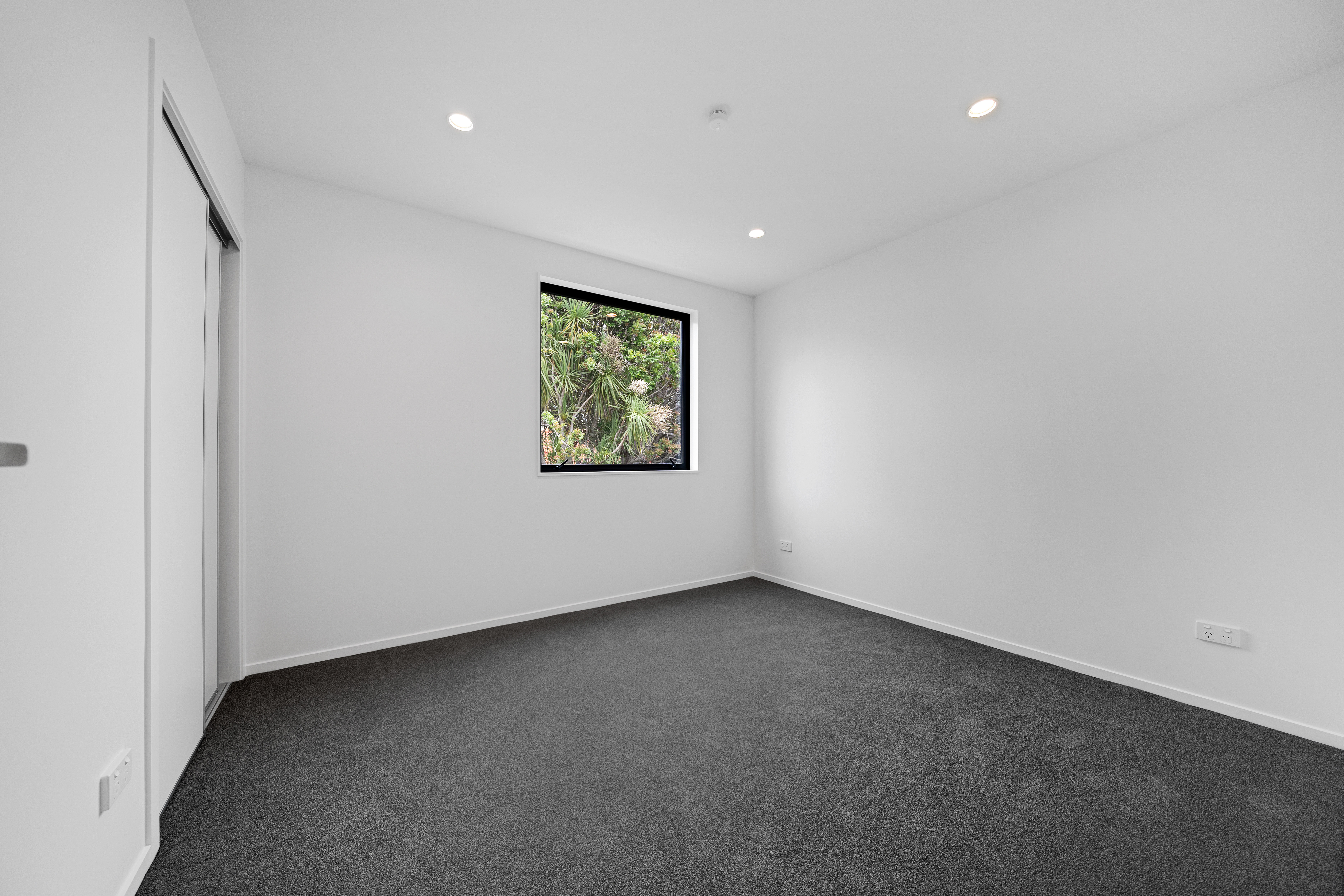 Brand New 2 bed 2 bath end unit + parking