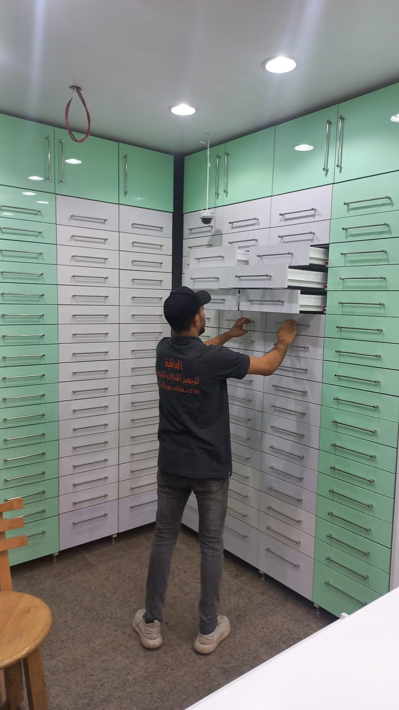 بعض الصور من اعمالنا { تجهيز صيدليات }