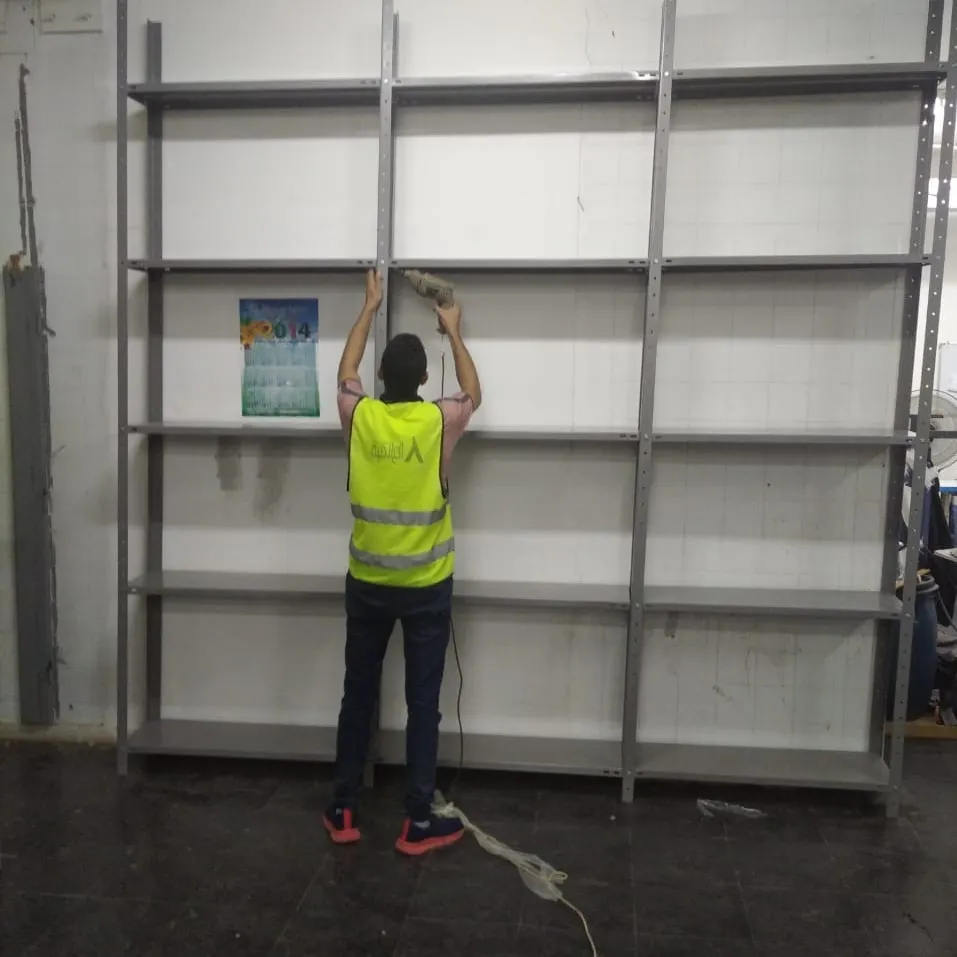 بعض الصور من اعمالنا { تجهيز مخازن }