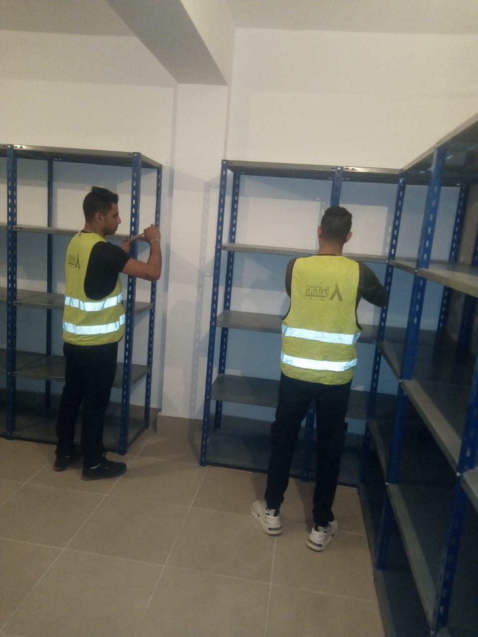 بعض الصور من اعمالنا { تجهيز مخازن }