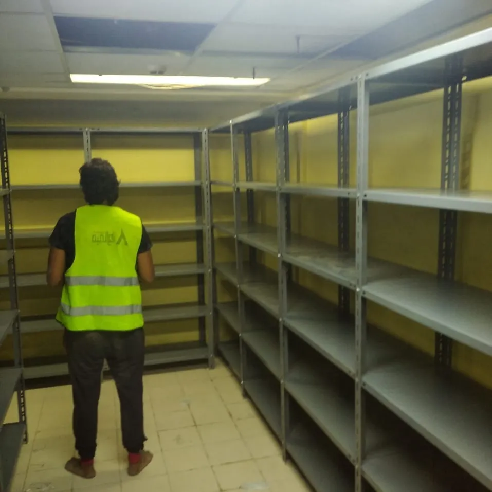 بعض الصور من اعمالنا { تجهيز مخازن }