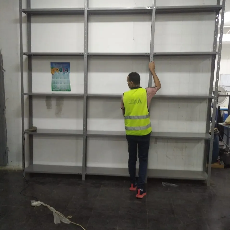 بعض الصور من اعمالنا { تجهيز مخازن }