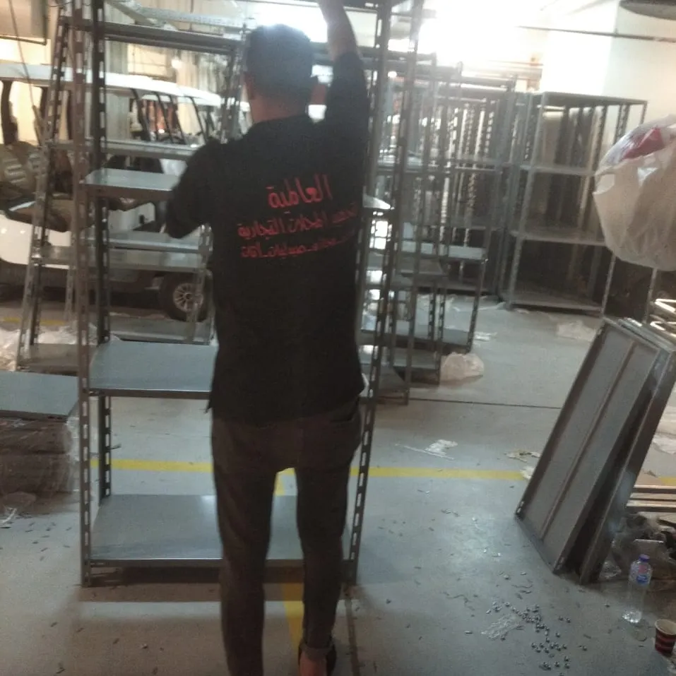 بعض الصور من اعمالنا { تجهيز مخازن }