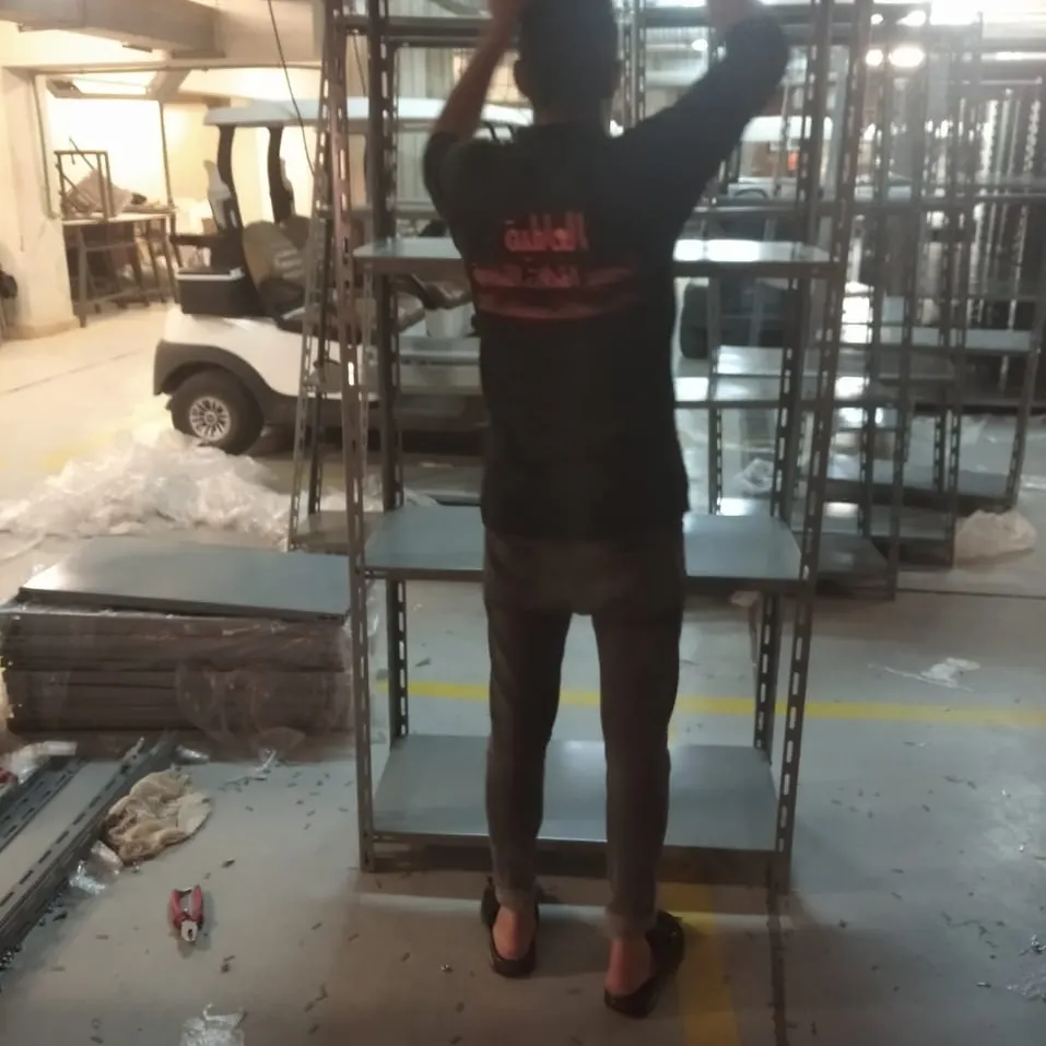 بعض الصور من اعمالنا { تجهيز مخازن }