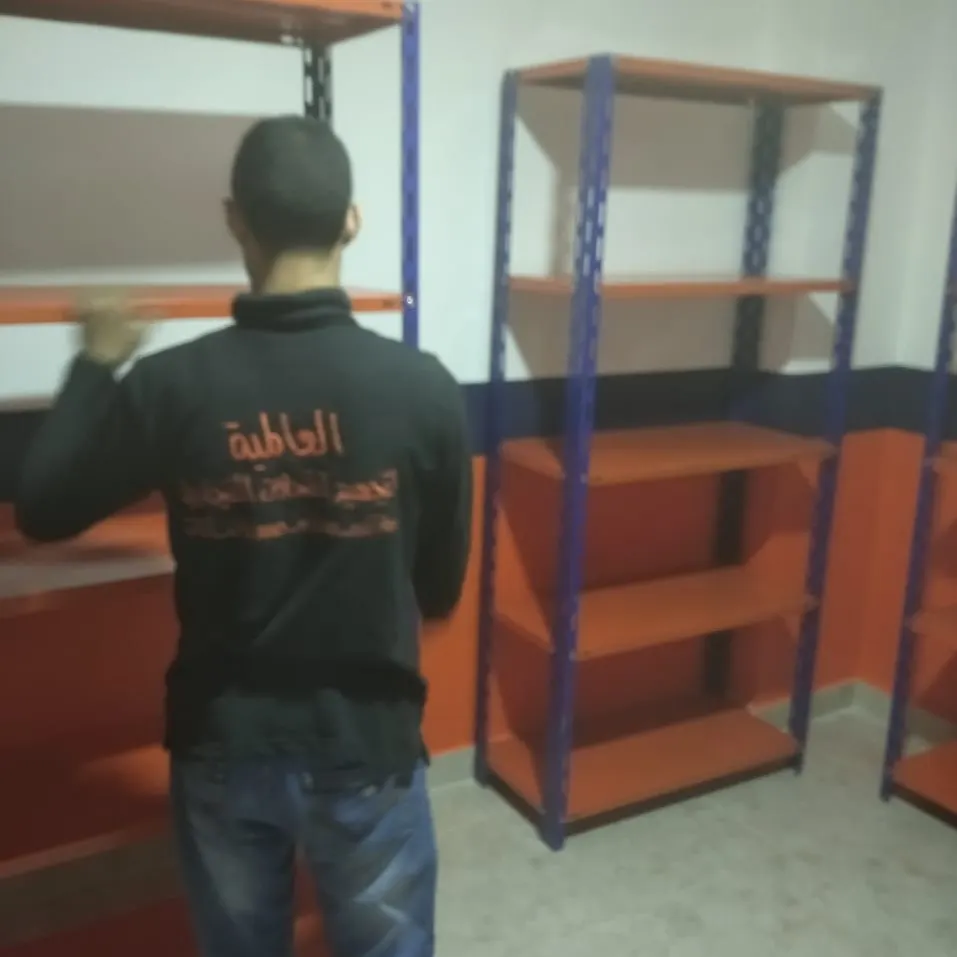 بعض الصور من اعمالنا { تجهيز مخازن }