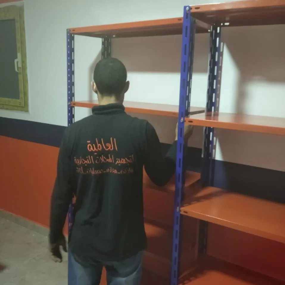 بعض الصور من اعمالنا { تجهيز مخازن }