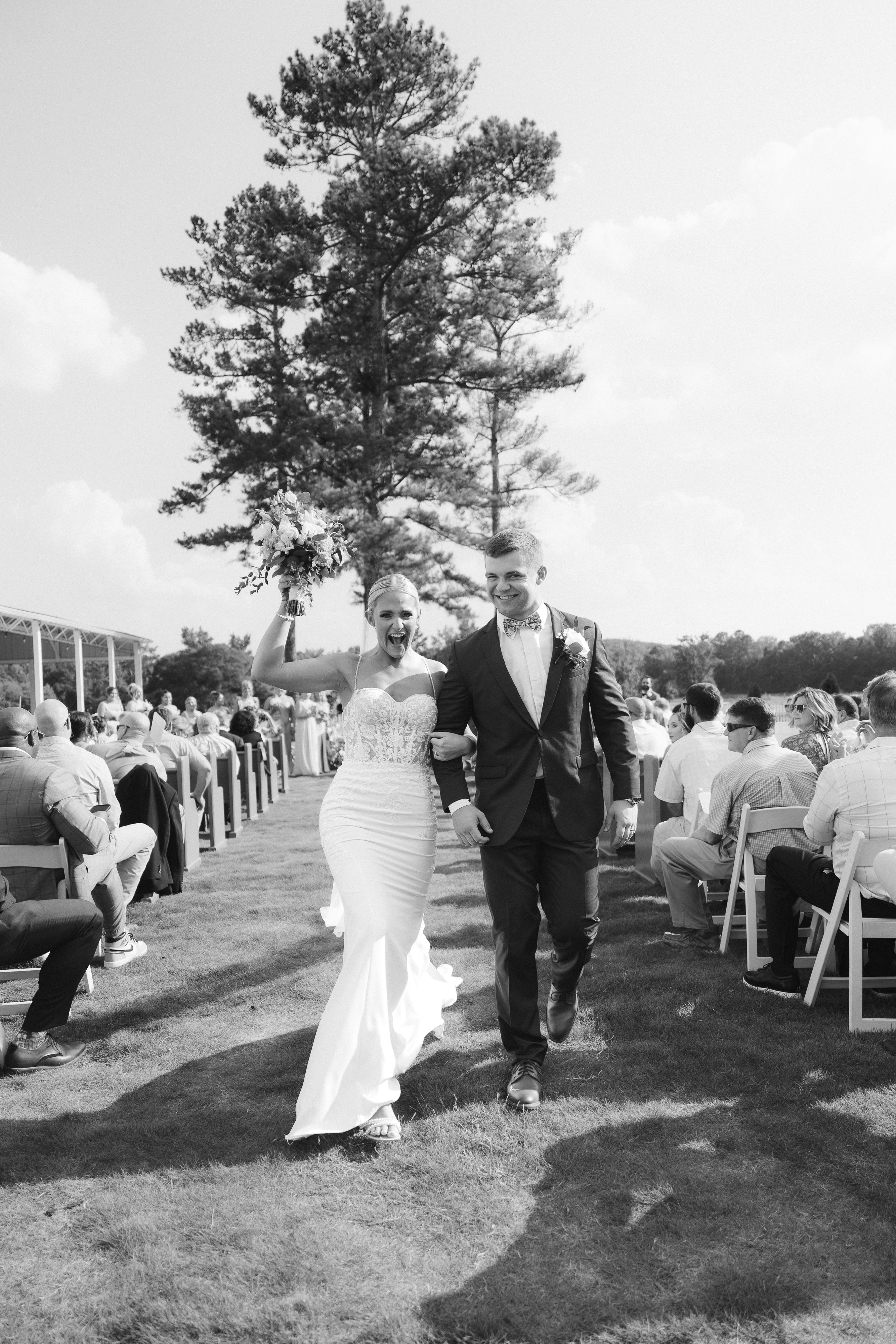 recessional of outdoor wedding ceremony in courtyard garden with fountain with scenic views in Monroe, GA, near Athens, Georgia