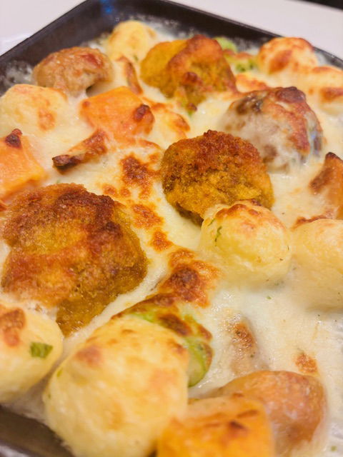 Le gratin de quenelles aux cèpes et potimarron