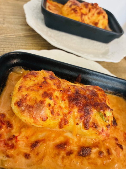 La quenelle de bar gratinée, sauce homard
