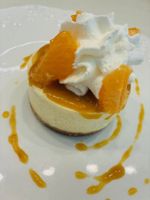 Le cheese cake aux agrumes, chantilly et coulis