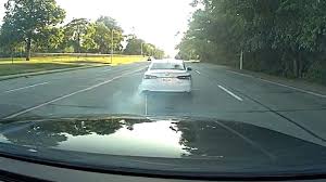 Police Grappler Tears Rear Axle Off Stolen Vehicle in Dramatic Michigan Chase