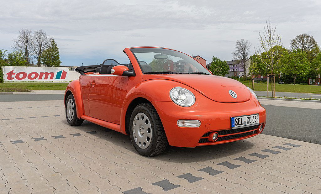 Orange VW New Beetle.