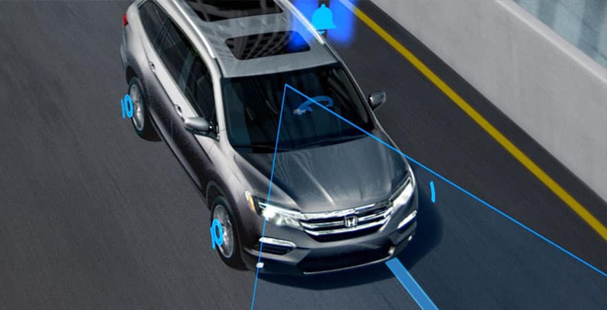 Honda Sensing road departure warning system.