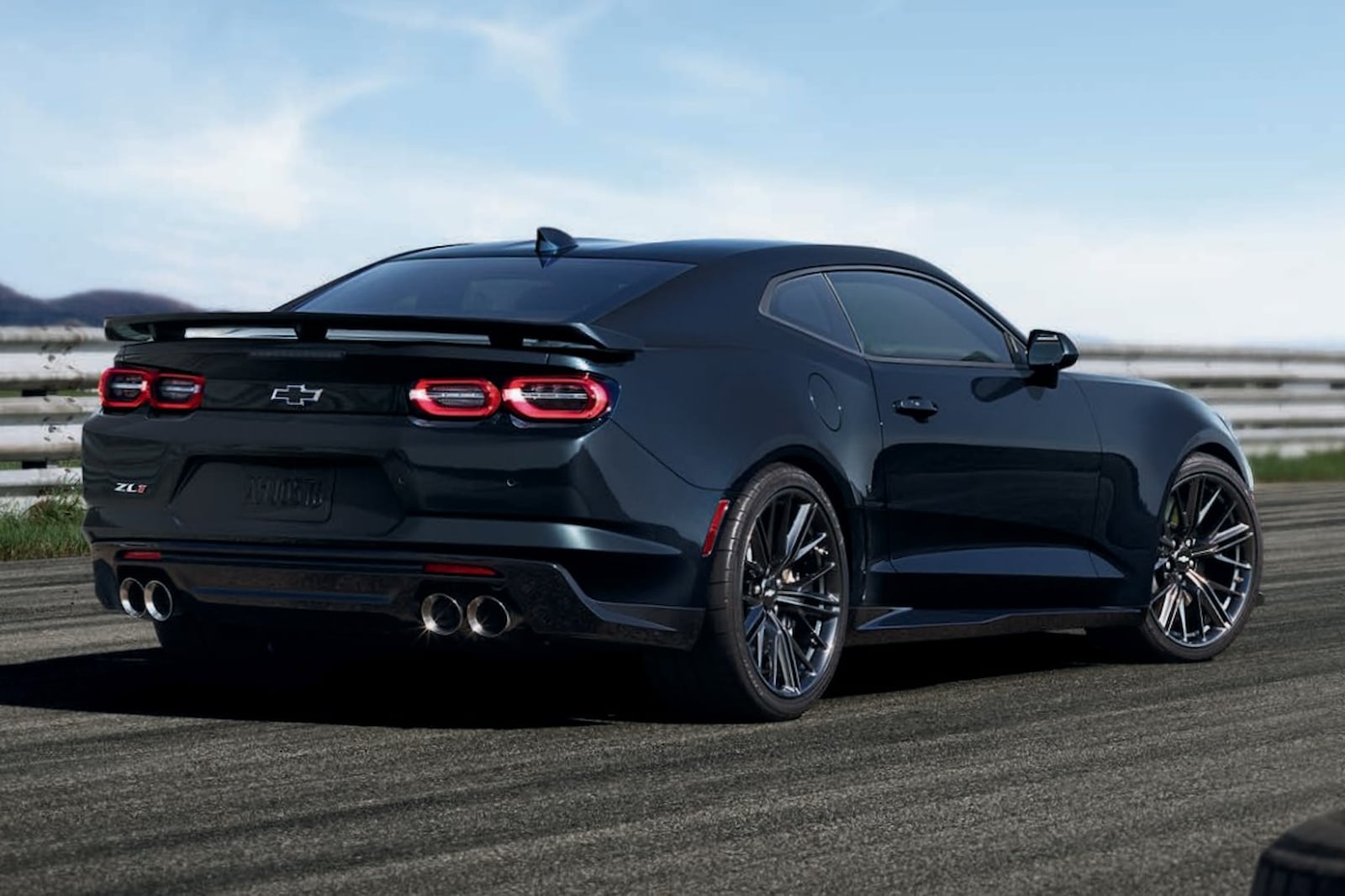 2023-chevrolet-camaro-zl1-coupe-rear-angle-view-carbuzz.