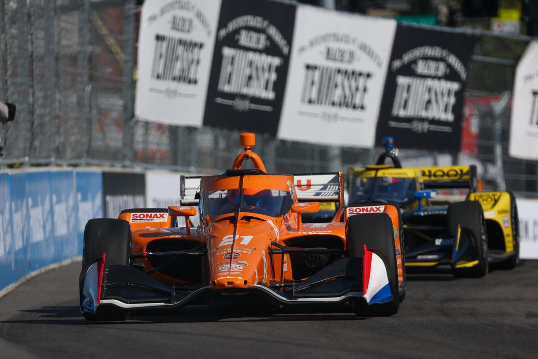 Scott Dixon makes contact with Rinus VeeKay via Rinus VeeKay.