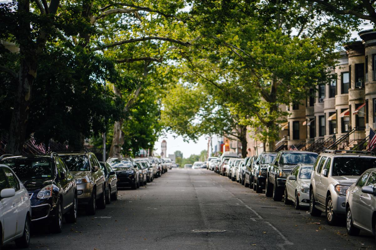 Sleeping overnight in a city-designated parking zone.