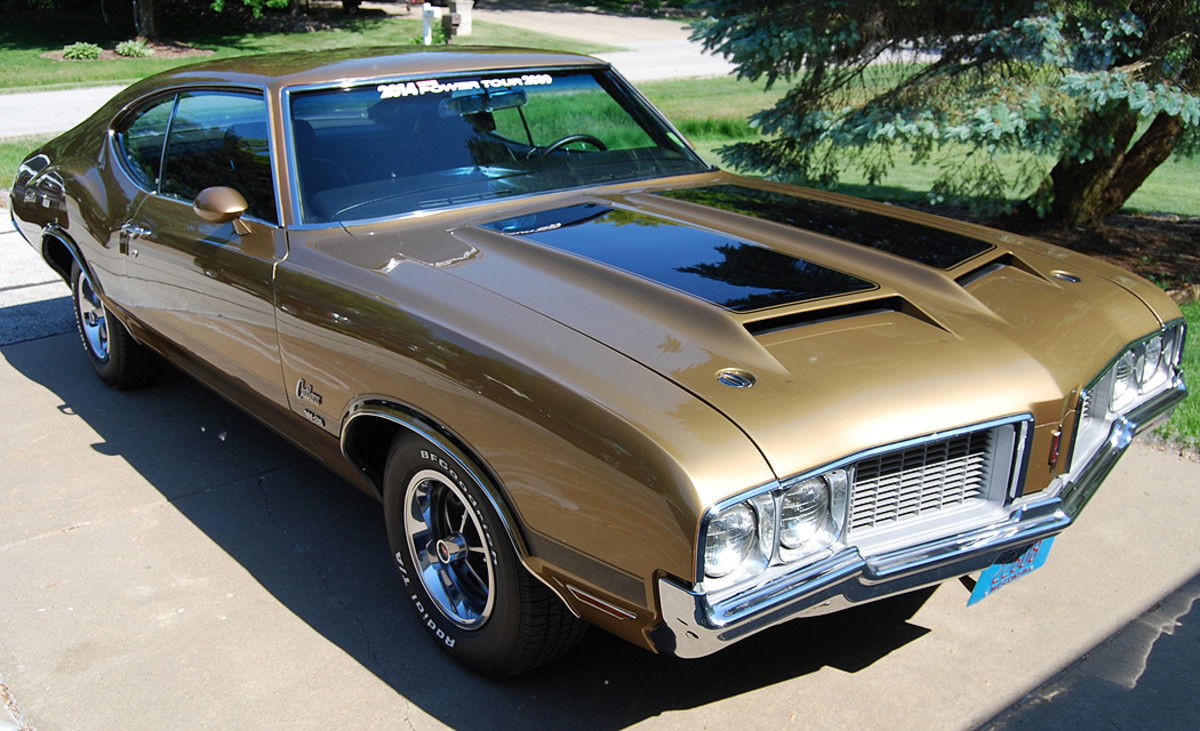 Affordable muscle cars: Oldsmobile Cutlass.