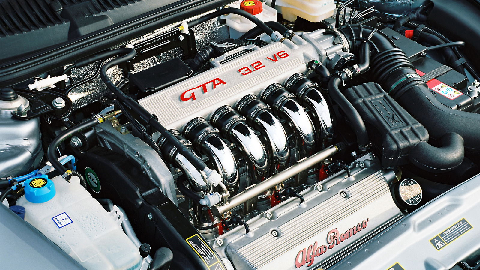 Six-cylinder engine sound.
