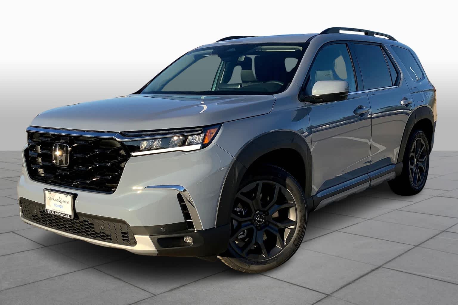 10 Best Family-Friendly Vehicles That Fit Three Car Seats Across: Honda Pilot.