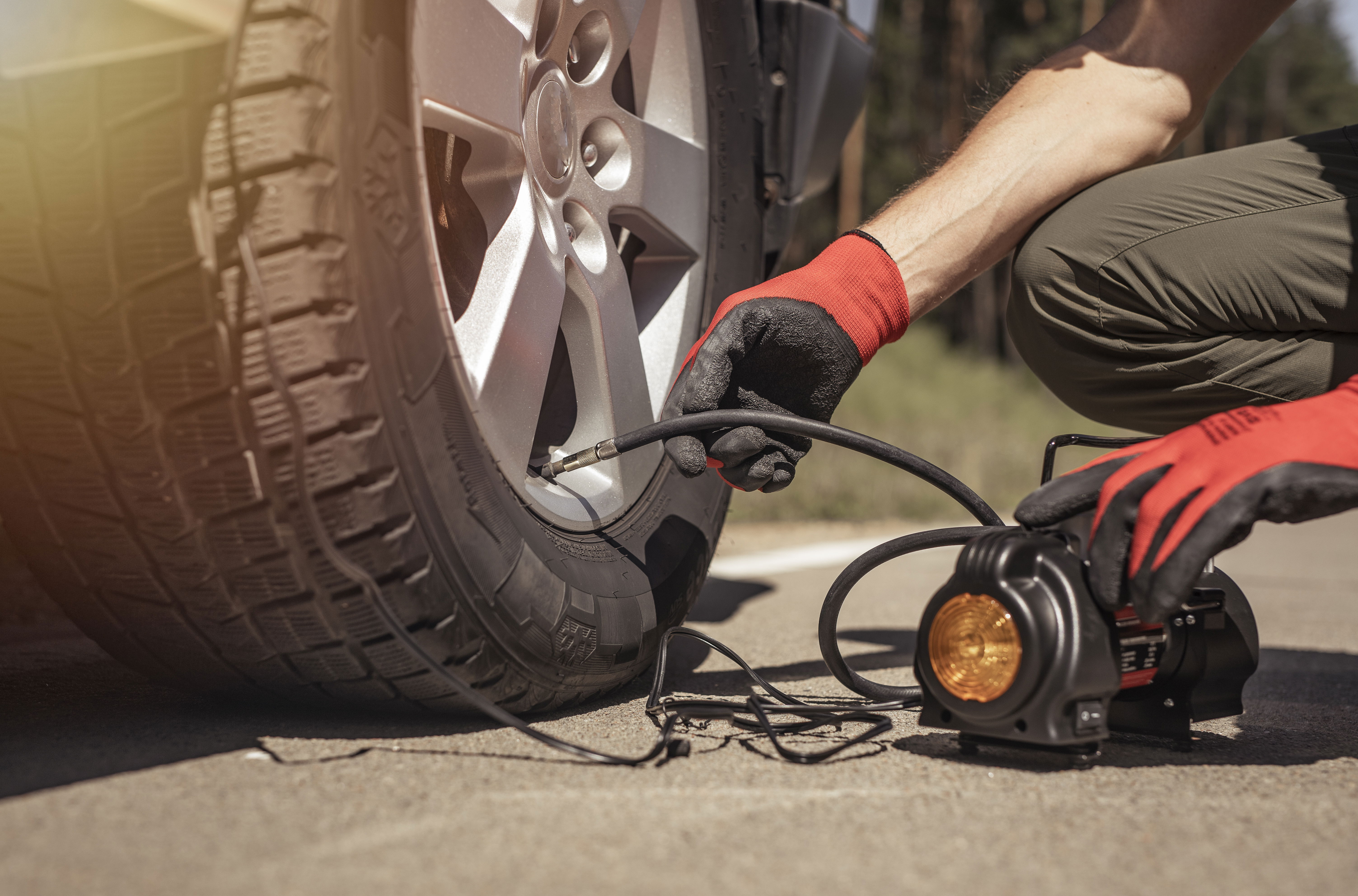 Road trip essentials: tire inflator and digital gauge.