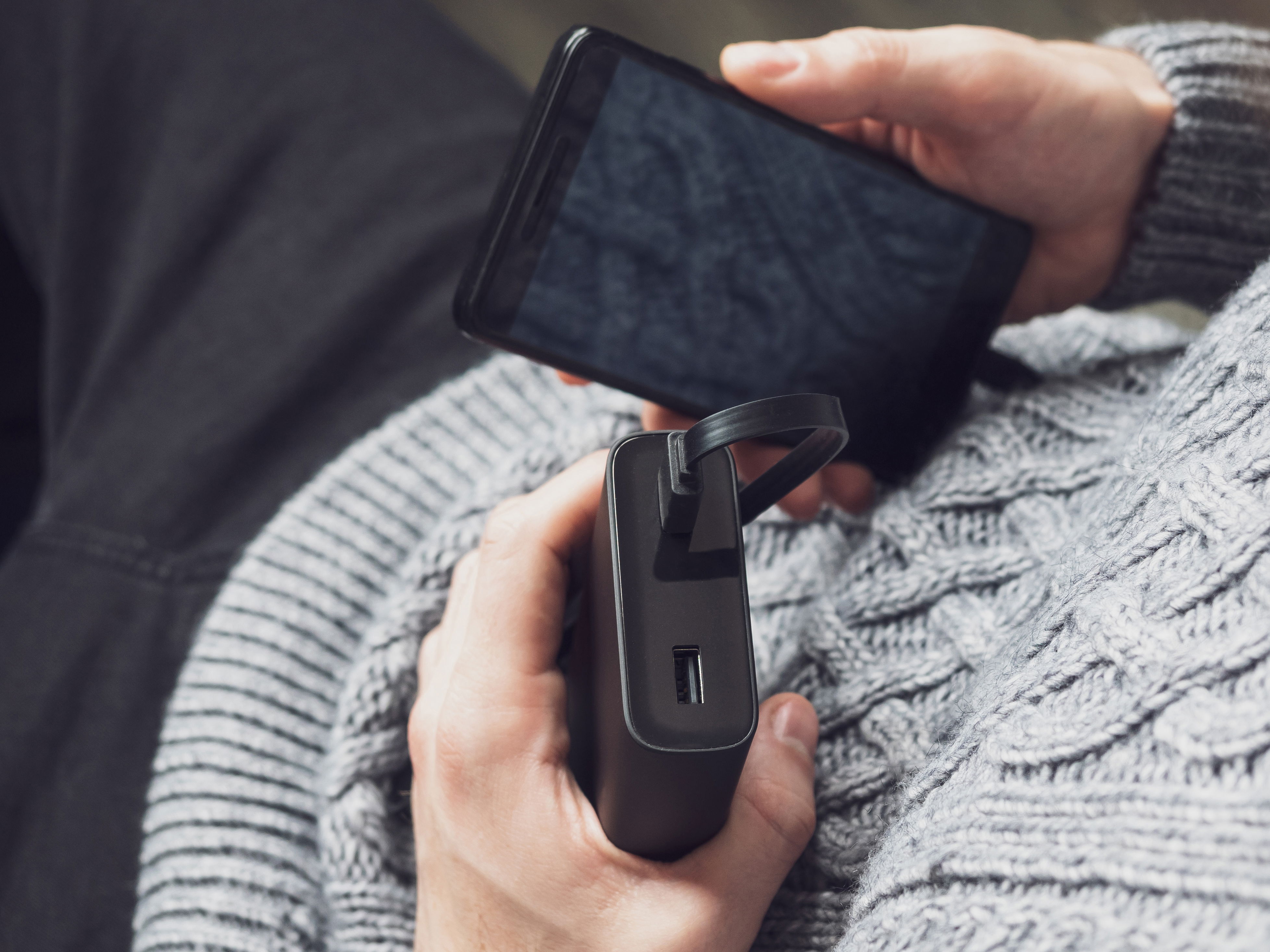 Winter driving survival kit: phone charger and power bank.