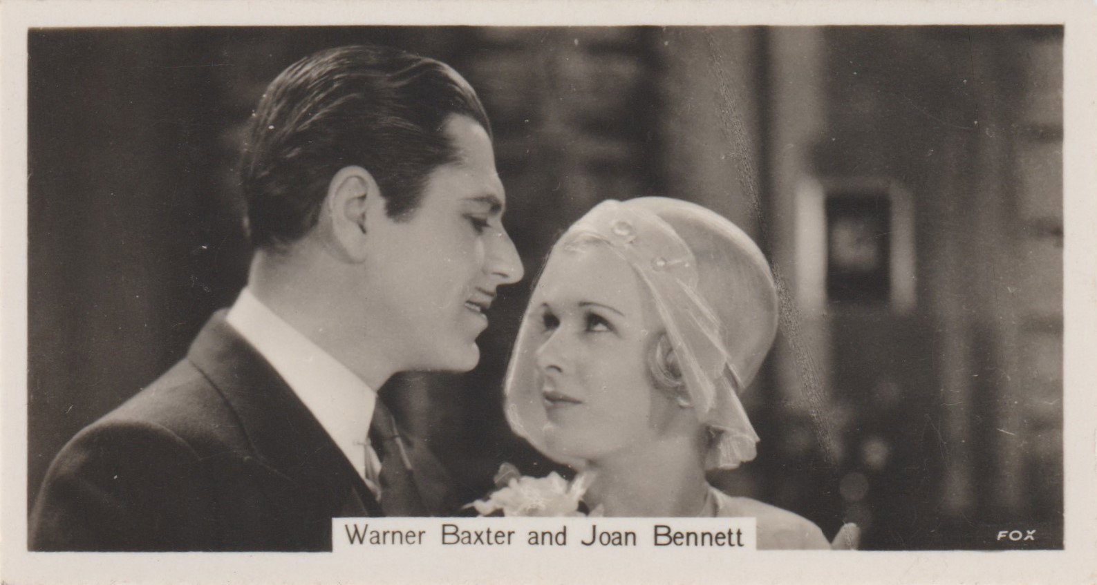 WARNER BAXTER AND JOAN BENNETT