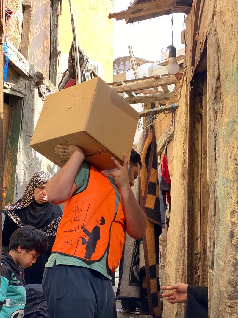  توزيع كراتين شهر رمضان الكريم