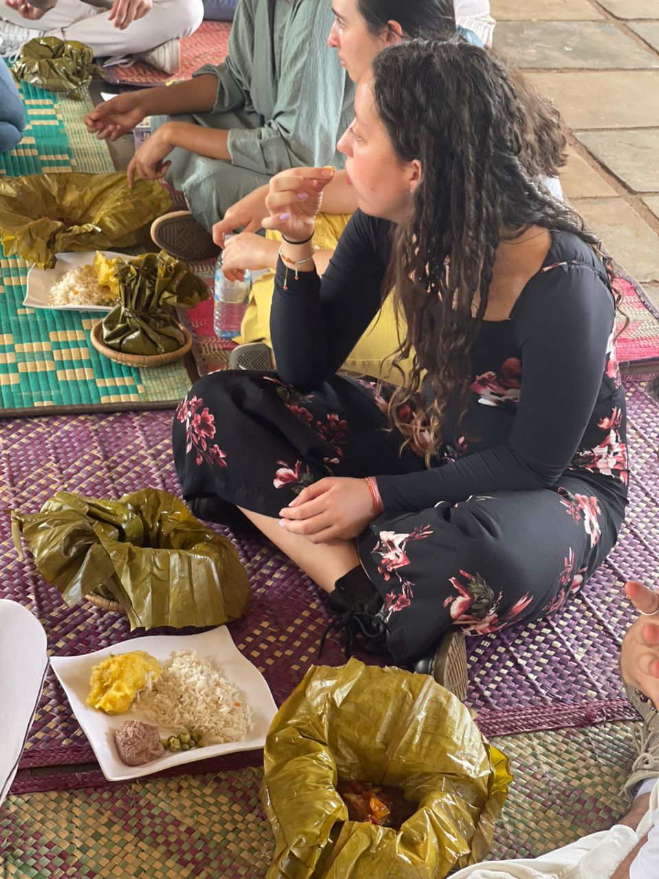 Tourist feasting on Luwombo