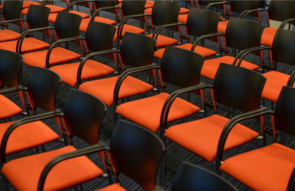 orange chairs in rows