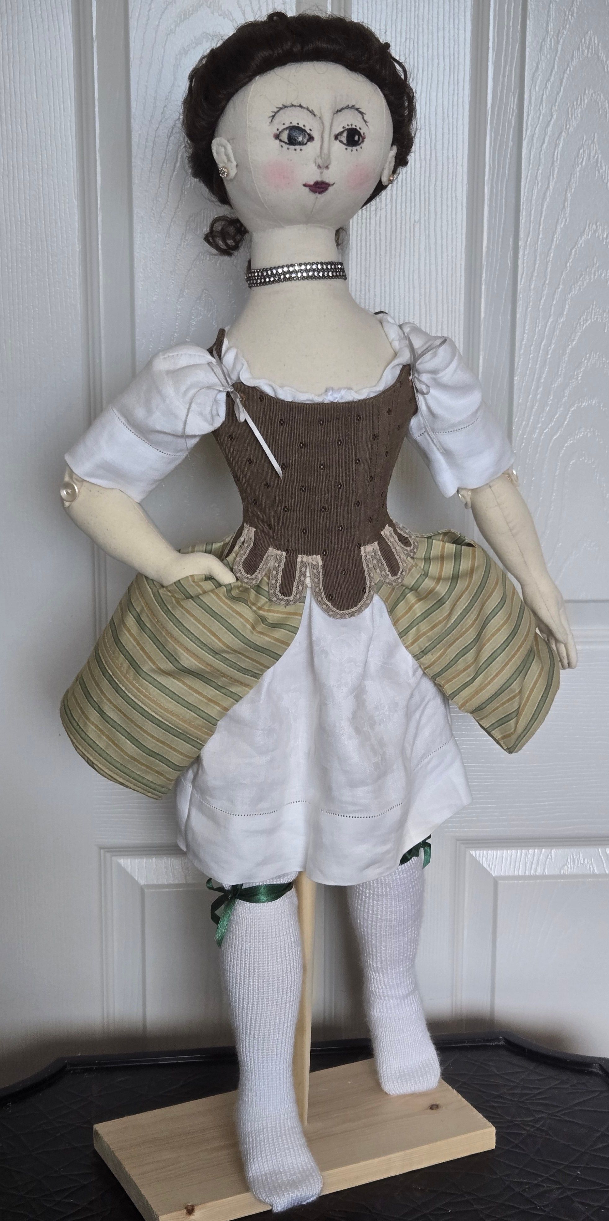 Adelaide waits to be gowned.