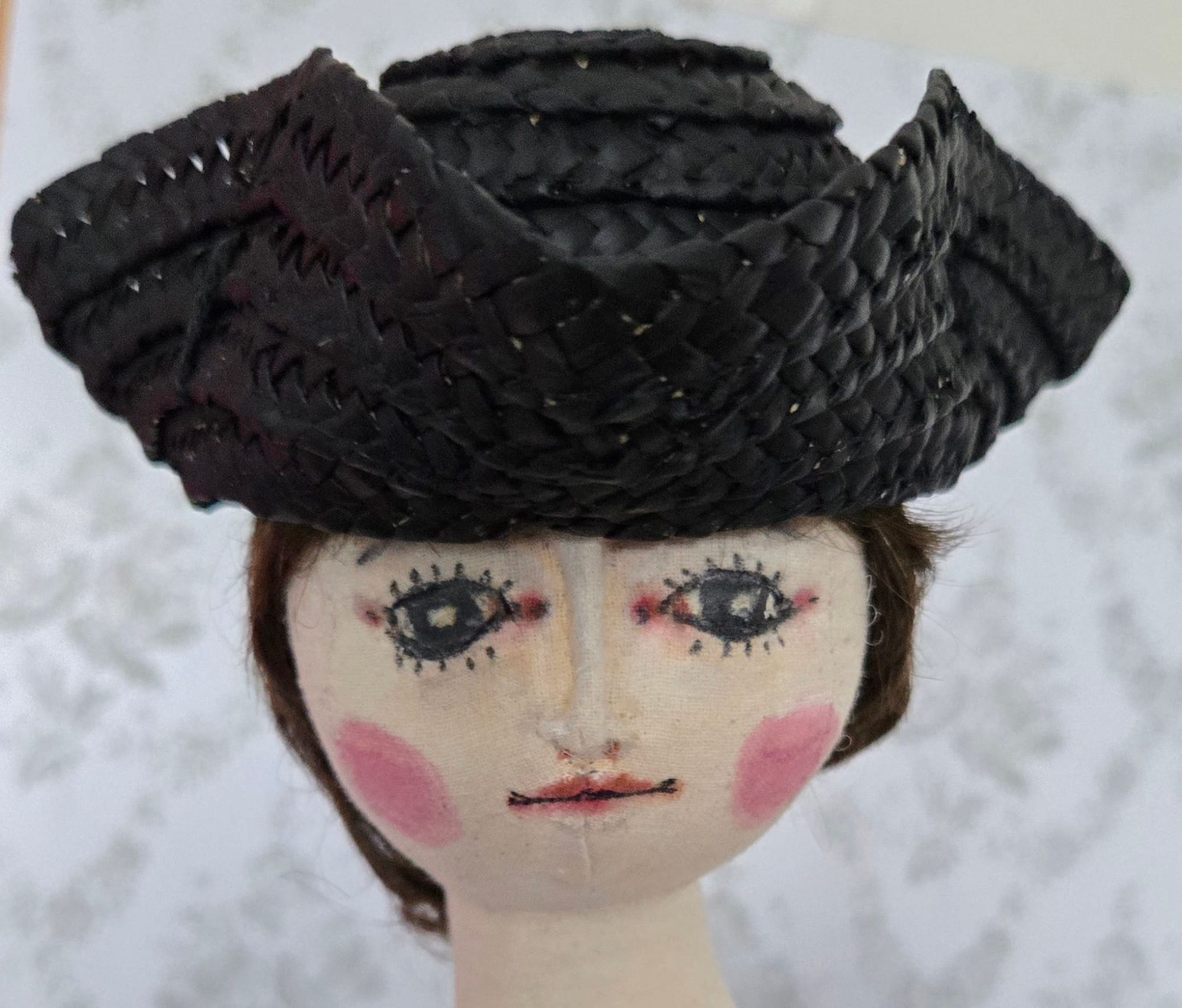 A straw tricorne from Italy