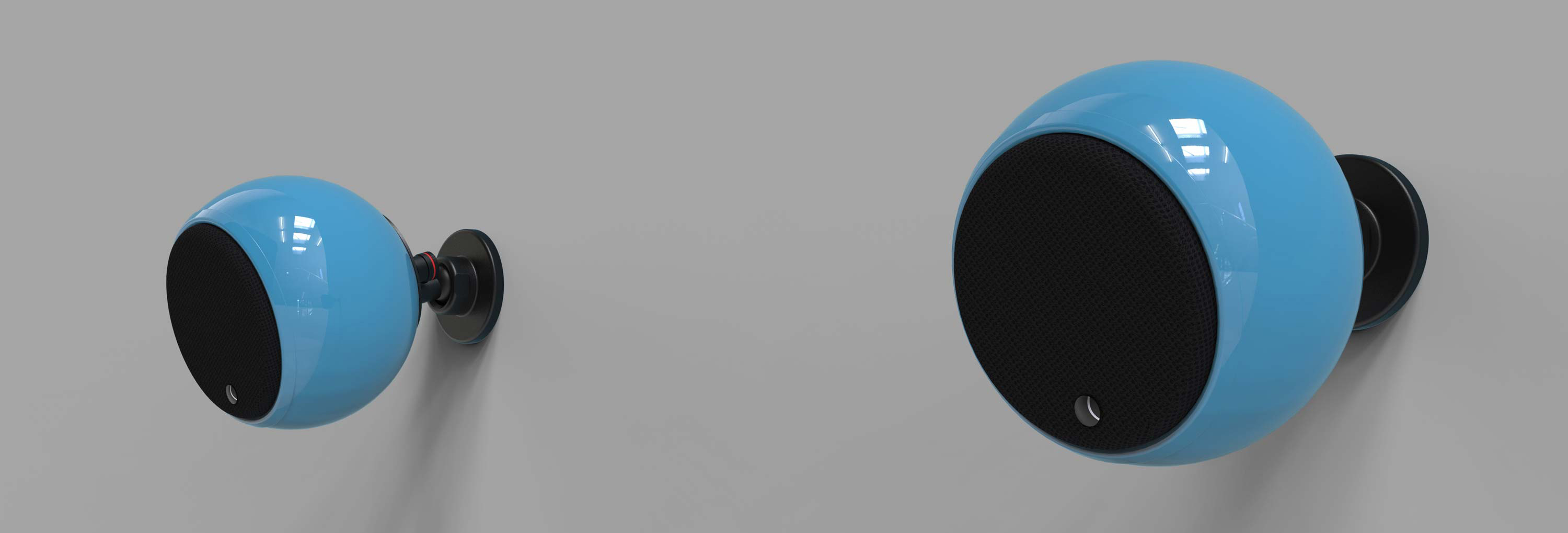 זוג רמקולים Gallo Acoustics Micro בצבע כחול תלויים על קיר אחד על יד השני במרחק של כחצי מטר אחד מהשני