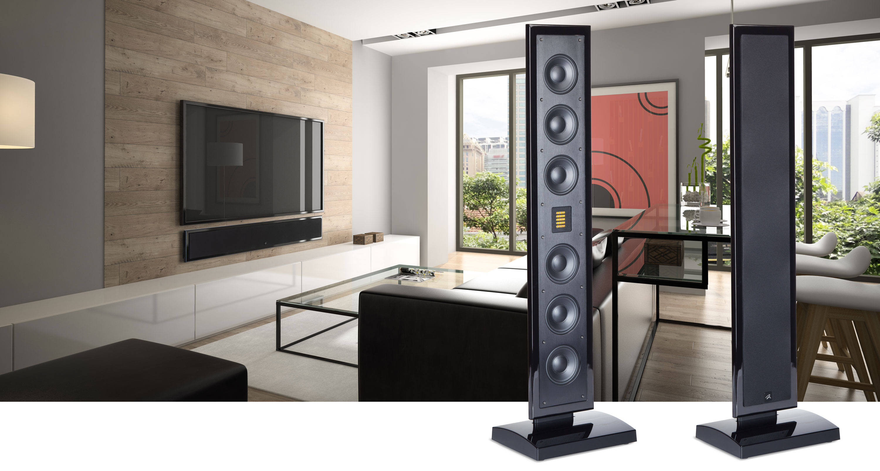 זוג רמקולים Martin Logan Motion SLM XL עומדים זה לצד זה על רקע סלון מודרני שממחיש את האוירה הנעימה מהם