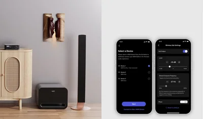 סאב וופר אקטיבי אלחוטי ווים WiiM Sub Pro מונח על רצפת פרקט בין שידה לרמקול מודרני מעוצב