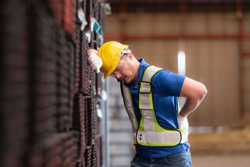 Warehouse Worker with Back and Shoulder Strain